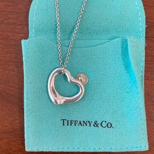 Tiffany & Co. Elsa Peretti open heart pendant. 16” chain. 16mm wide pendant.